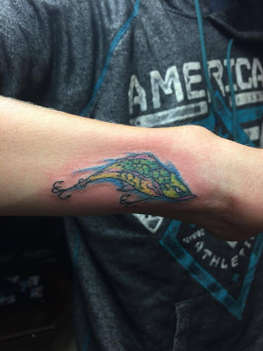 Explore men's shin tattoo ideas, creative tattoo ideas in Bowling Green, available at Taboo Tattoos and Piercings