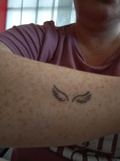 Explore tattoo cover up ideas for cross, creative tattoo ideas in Oxford, available at The Beauty Mark, LLC