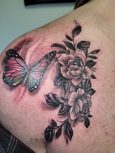 Explore small mountain tattoo ideas, creative tattoo ideas in Angola, available at Hoodlum Ink