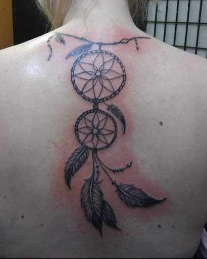 Explore holy spirit tattoo ideas, creative tattoo ideas in Detroit, available at Swagg Shop (tattoos and piercings)