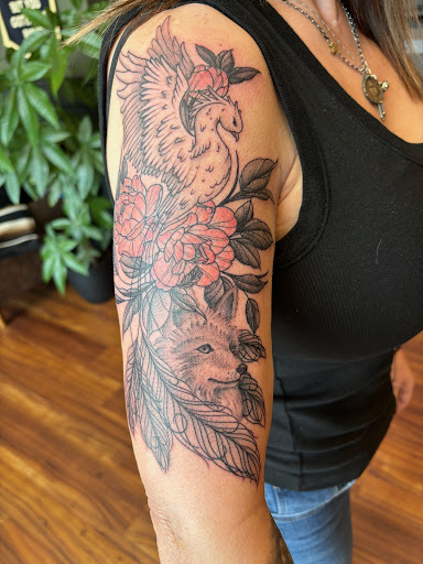 Explore gangsta tattoo sleeve ideas, creative tattoo ideas in Garden City, available at Branded Bear Tattoo