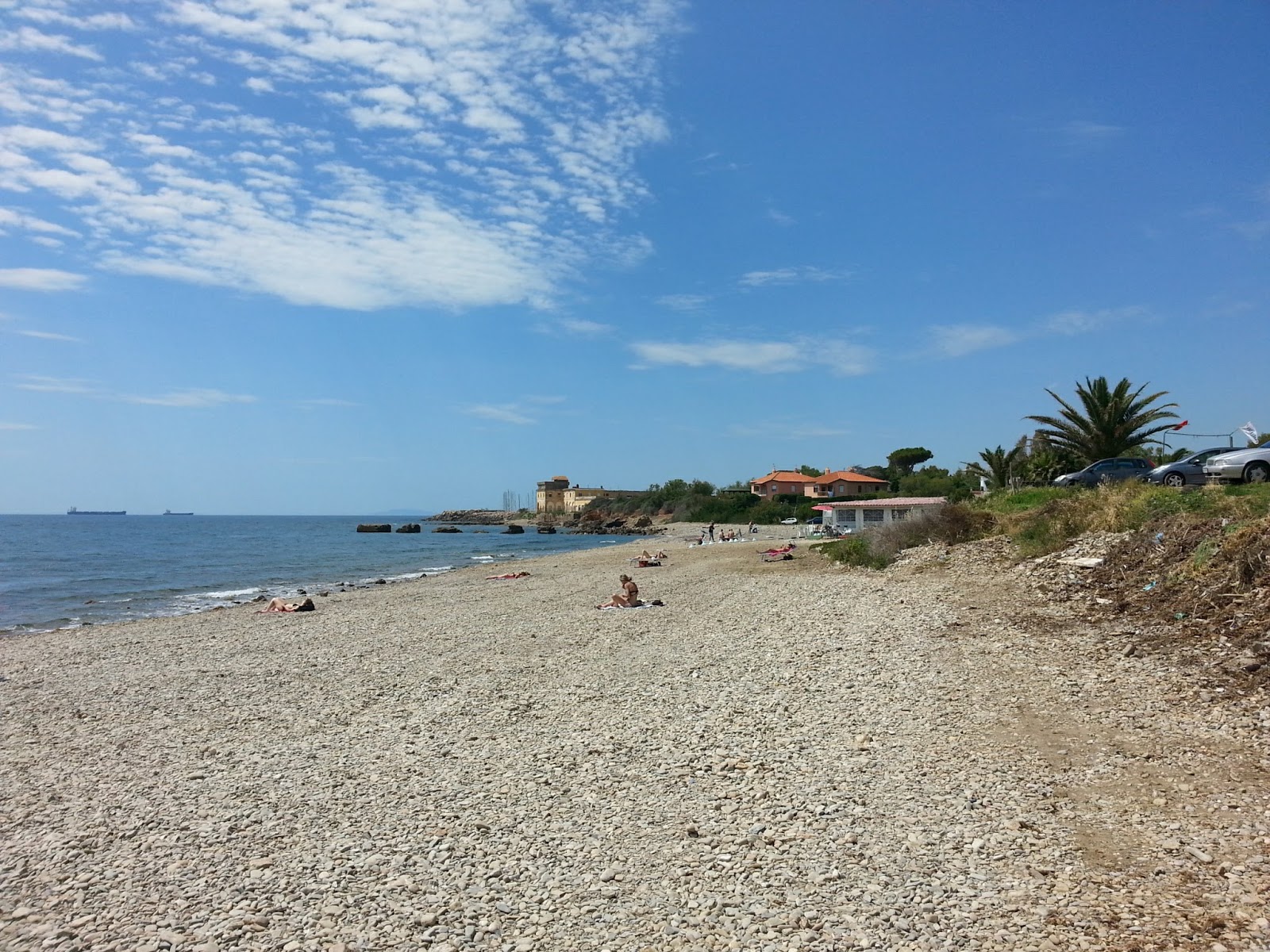Φωτογραφία του Spiaggia Marangone με γκρίζο βότσαλο επιφάνεια