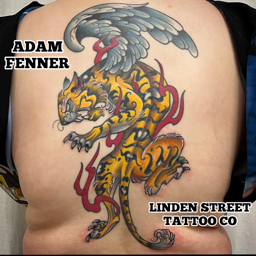Explore cover up tattoo ideas on thigh, creative tattoo ideas in Fort Collins, available at Linden Street Tattoo Company