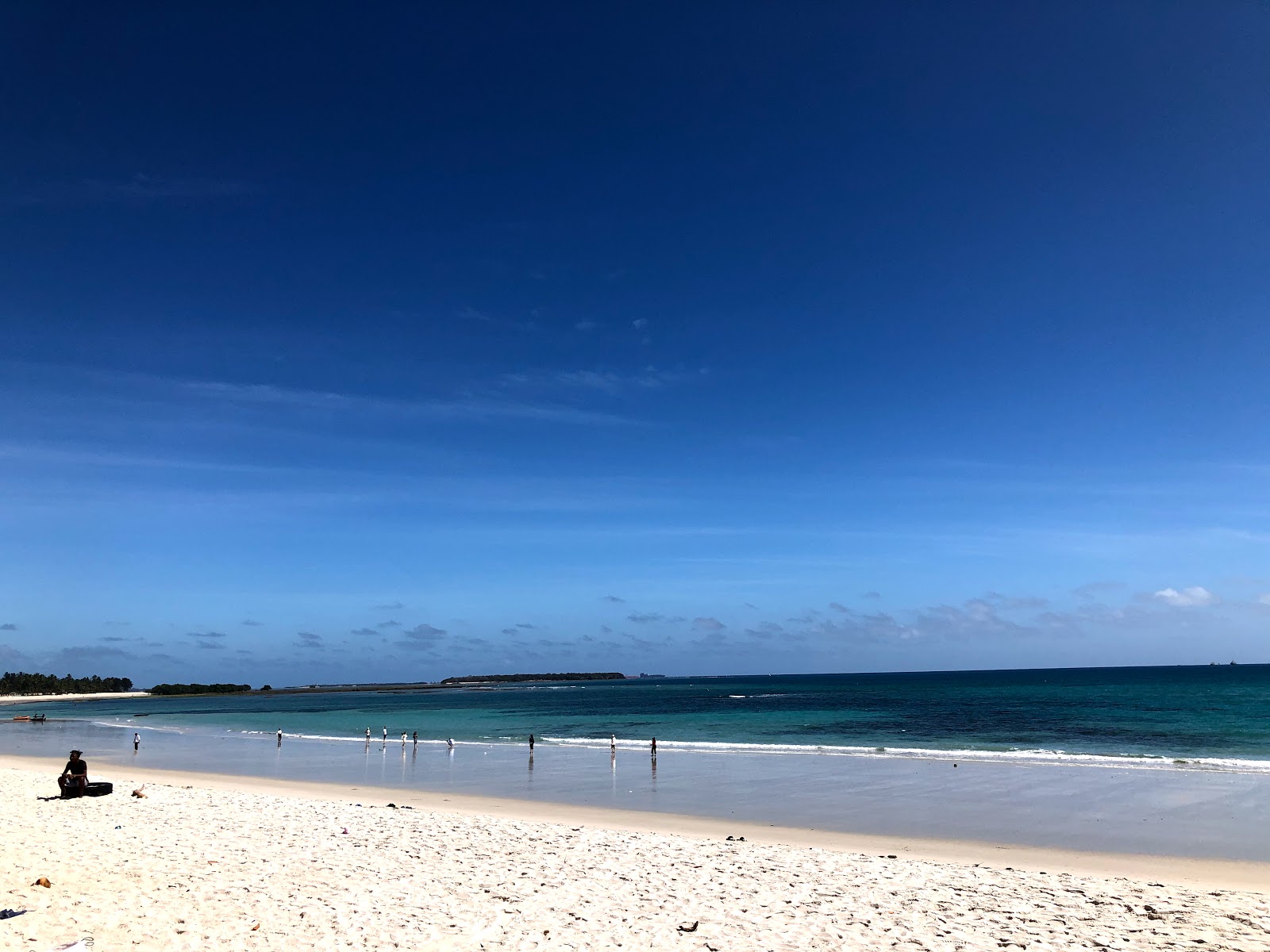 Foto av Family Beach med lång rak strand