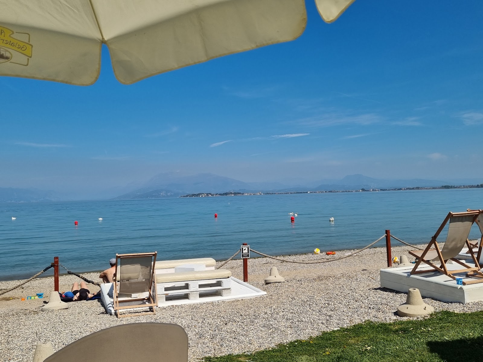 Foto von Spiaggia Cala de Or annehmlichkeitenbereich
