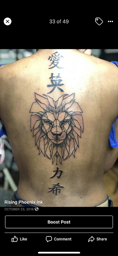 Explore cover up tattoo ideas lower back, creative tattoo ideas in Jamaica, available at Rising Phoenix Ink