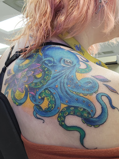 Explore rapper tattoo ideas, creative tattoo ideas in Saint Petersburg, available at Edens Apple Tattoos and Piercings