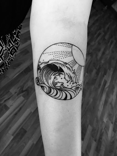 Explore tattoo placement ideas for women, creative tattoo ideas in Peoria, available at Iron Key Tattoo Studio Inc.