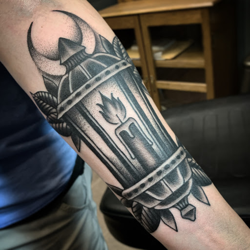 Explore tattoo sleeve black and grey ideas, creative tattoo ideas in Grandville, available at Lighthouse Tattoo Company