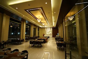 Om Hotel and Restaurant image