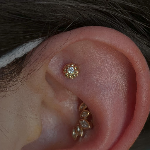 Explore chin tattoo ideas, creative tattoo ideas in Boston, available at Arcadia Body Piercing
