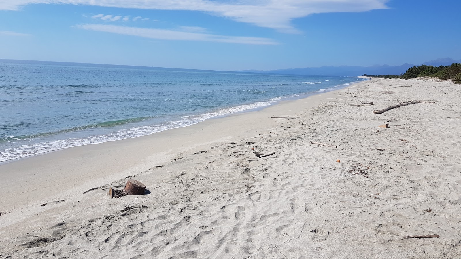 Fotografija Plage de Casabianda z svetel pesek površino
