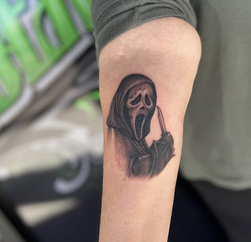 Explore script tattoo ideas for men, creative tattoo ideas in Peoria, available at Modern Ink Tattoo