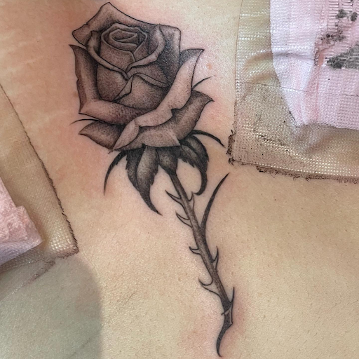 Explore lifeguard tattoo ideas, creative tattoo ideas in Georgetown, available at Iron Rite Tattoo South