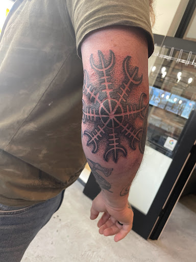 Explore tattoo ideas for your son, creative tattoo ideas in Great Falls, available at Alpha Tattoos & Piercings