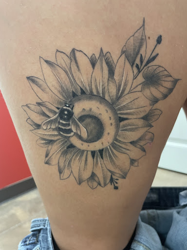 Explore thai tattoo ideas, creative tattoo ideas in Camden, available at The Golden Goose Tattoo Studio