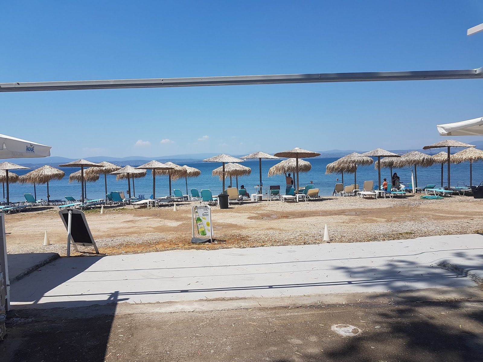 Valokuva Agios Andreas beachista. puhtaustasolla keskipitkä