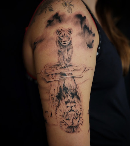 Explore cover up tattoo ideas on ankle, creative tattoo ideas in Minocqua, available at Whisky Rose Tattoo Parlor