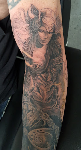 Explore back tattoo ideas for females, creative tattoo ideas in Wichita, available at Body Canvas Tattooing