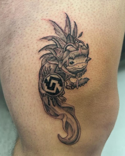 Explore inner bicep tattoo ideas for guys, creative tattoo ideas in Anaheim, available at Autumn Moon Tattoo