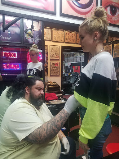 Explore grumpy bear tattoo ideas, creative tattoo ideas in Tucson, available at Enchanted Dragon