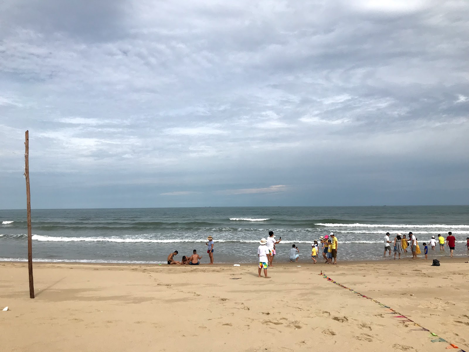 Fotografija Minh Chau Beach z prostorna obala