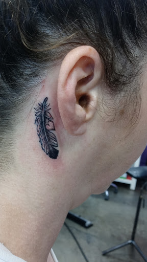 Explore matching tattoo ideas for father and son, creative tattoo ideas in Everett, available at Tattoosmith & Company