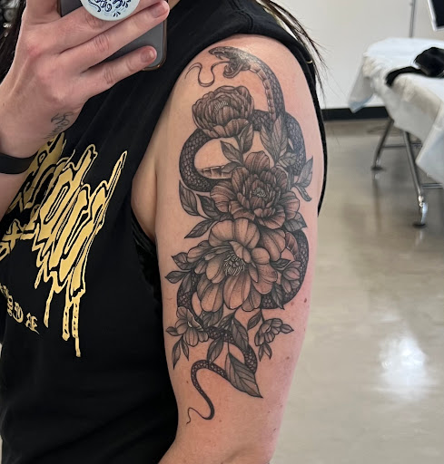 Explore female chest piece tattoo ideas, creative tattoo ideas in Flat Rock, available at The Gallows Tattoo Studio