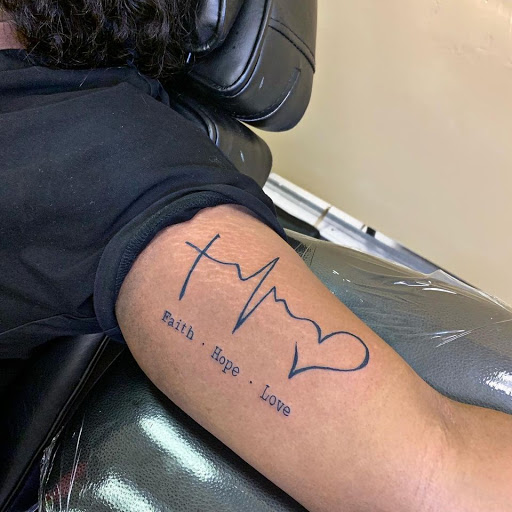 Explore arm tattoo ideas for women, creative tattoo ideas in Kenner, available at Tattoology