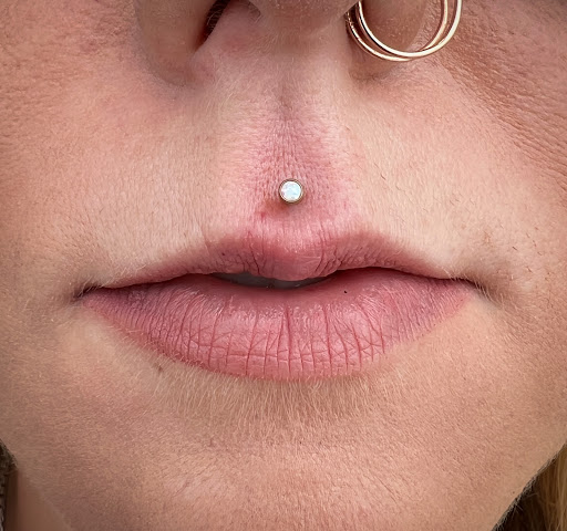 Explore nightmare before christmas tattoo ideas, creative tattoo ideas in Terre Haute, available at Piercings by Brett Rice - godpiercethequeen