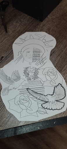 Explore red tattoo ideas, creative tattoo ideas in Ocala, available at Black Lotus Tattoo & Art Gallery Inc