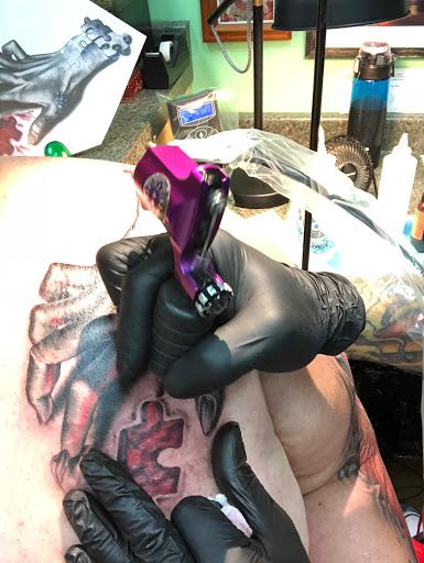 Tattoo Shop «Rock-A-Billy Tattoo & Piercing Studio», reviews and photos, 4576 N University Dr, Lauderhill, FL 33351, USA