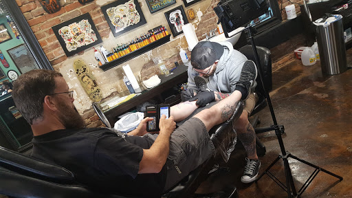 Explore tattoo on thigh ideas, creative tattoo ideas in Nashville, available at Dead Ahead Tattoo Co.