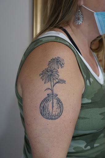 Explore scar cover up tattoo ideas, creative tattoo ideas in Grand Rapids, available at Sparrows Nest Tattoo Studio