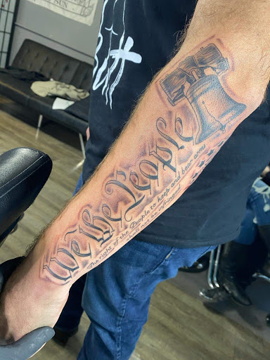 Explore christian half sleeve tattoo ideas, creative tattoo ideas in Ottawa, available at Dreams & Themes Tattoo Studio