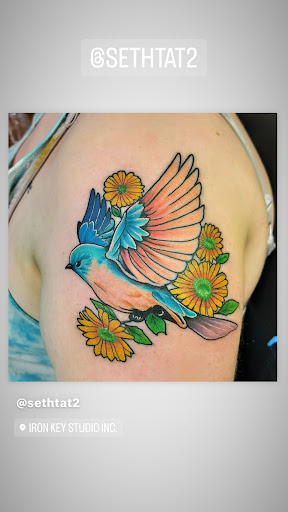 Explore tattoo ideas for black men, creative tattoo ideas in Peoria, available at Iron Key Tattoo Studio Inc.