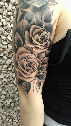 Explore invictus tattoo ideas, creative tattoo ideas in Georgetown, available at One Love Tattoos