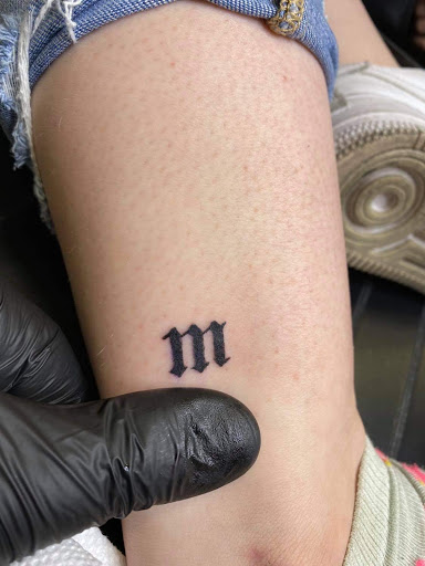 Explore bearded dragon tattoo ideas, creative tattoo ideas in Kearney, available at Babalus Professional Tattoo Studio