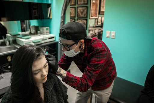 Explore olivia tattoo ideas, creative tattoo ideas in Denver, available at Mantra Tattoo and Piercing