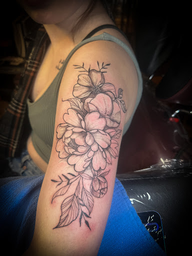 Explore back arm tattoo ideas for guys, creative tattoo ideas in Moweaqua, available at Fleshwound Tattoo