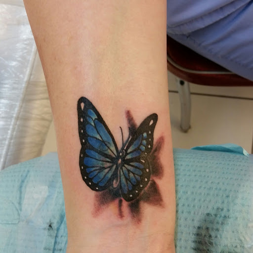 Find tattoo ideas for under the breast for your next unique tattoo in Duluth at Tattoo Fiesta