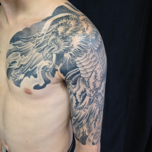 Explore tattoo ideas for elbow, creative tattoo ideas in Peoria, available at Iron Key Tattoo Studio Inc.