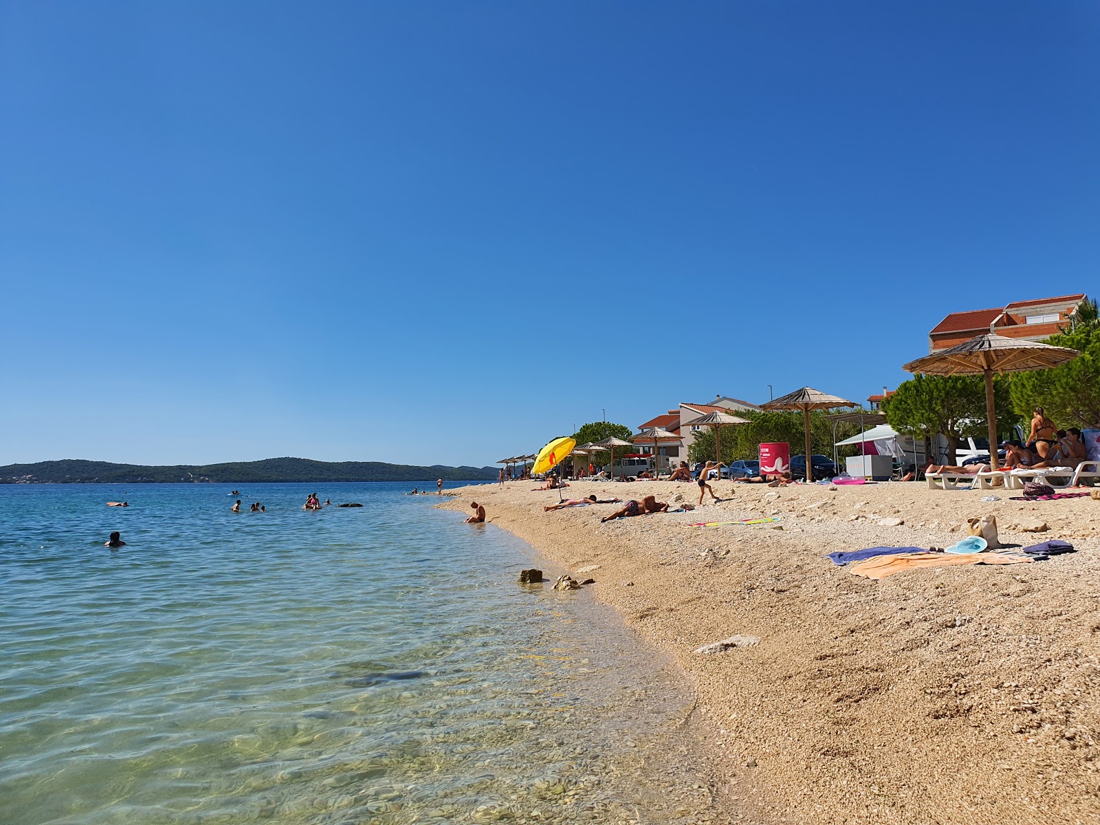 Punta Bibinje beach'in fotoğrafı hafif ince çakıl taş yüzey ile