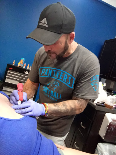 Explore police officer tattoo ideas, creative tattoo ideas in Monroe, available at Skin City Tattoo Studio