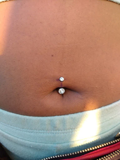 Explore cover up tattoo ideas lower back, creative tattoo ideas in Libertyville, available at Lucky Seven Tattoo