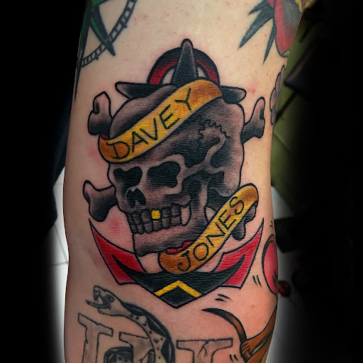 Explore charlie brown tattoo ideas, creative tattoo ideas in Honolulu, available at Sacred Art Tattoo Waikiki