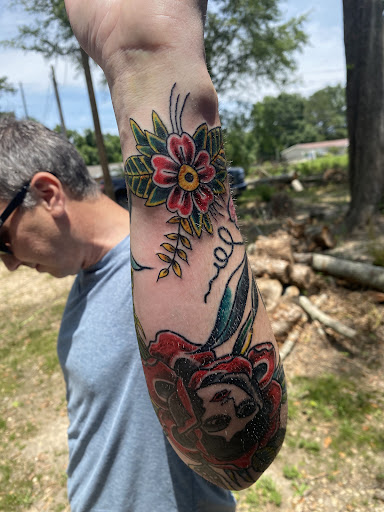 Explore unique sleeve tattoo ideas for females, creative tattoo ideas in Hattiesburg, available at Sinful Aart Tattoo