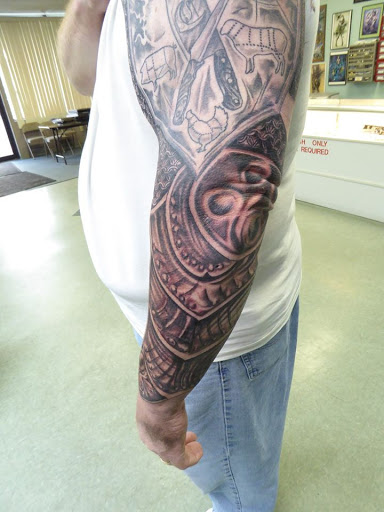 Explore cervical cancer tattoo ideas, creative tattoo ideas in Huntsville, available at Kreations Tattoos & Body Piercing