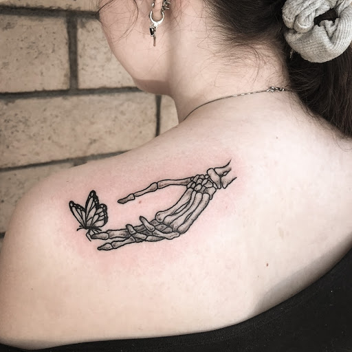 Explore small skull tattoo ideas, creative tattoo ideas in Los Alamitos, available at Mr. Inkwells Classy Tattoos