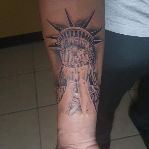 Explore tattoo ideas dog, creative tattoo ideas in Warner Robins, available at Untold Pain Tattoo Studio